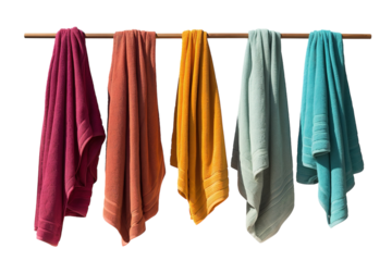 A Rainbow of Towels Drying in the Summer Sun on a White or Clear Surface PNG Transparent Background