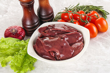 Raw turkey liver in a bowl ready for cooking
