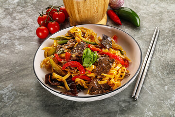 Asian wok with noodle, vegetables and beef