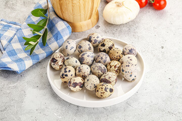 Raw quail eggs in the bowl