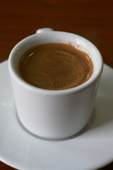 a cup of turkish coffee on table 