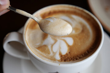late coffee on cafe table at cafe background 