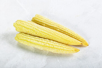 Raw sweet baby corn heap