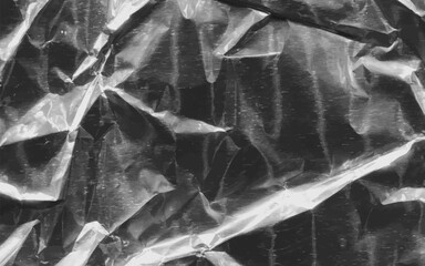 Abstract transparent plastic wrap wrinkled texture on black background. Vector illustration vinyl, texture overlay effect of an old cover with defects and scuffs. Wrinkled, torn and old packaging.