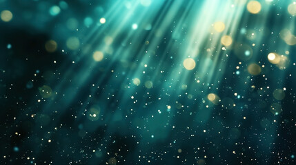 Fototapeta premium Abstract image of teal bokeh lights with rays of light creating ethereal atmosphere.