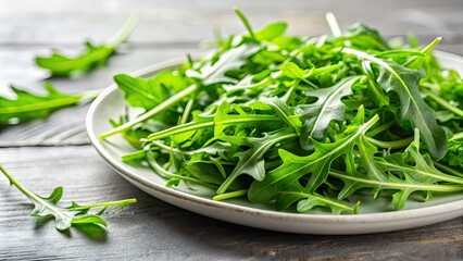 Vibrant close-up of fresh arugula leaves on a white plate, arugula, green, salad, nutrient-rich, healthy, organic, vegetable