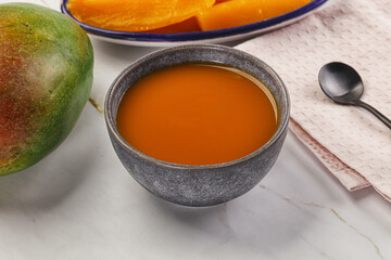 Sweet mango puree in the bowl