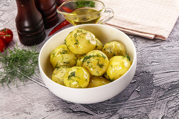 Young boiled potato with dill