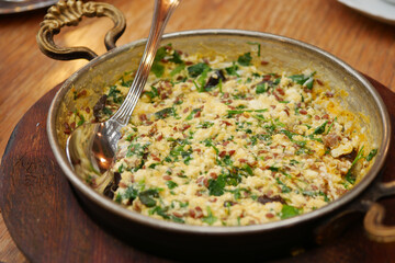  herb Egg Omelette on in a pan table 