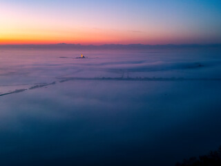 The golden island. Grado Island from above at sunset.