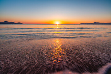 sunset over the sea © Artem