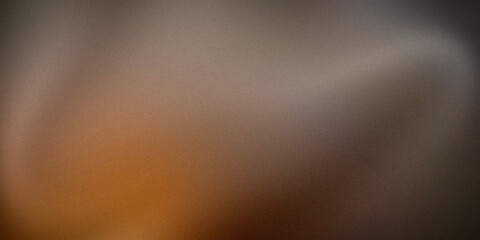 Subtle gradient background featuring warm shades of orange, brown, and gray. This soft and earthy gradient creates a calming and natural visual effect