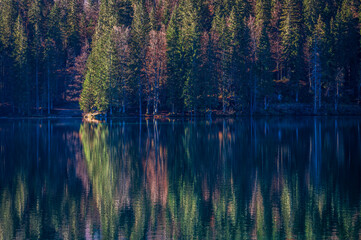 Morning in the Fusine lakes valley. Autumn reflections.