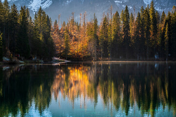 Morning in the Fusine lakes valley. Autumn reflections.