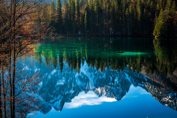 Morning in the Fusine lakes valley. Autumn reflections.