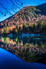 Morning in the Fusine lakes valley. Autumn reflections.