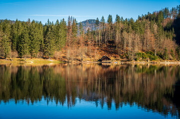 Morning in the Fusine lakes valley. Autumn reflections.