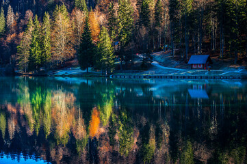 Morning in the Fusine lakes valley. Autumn reflections.