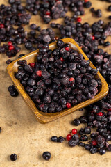 various blueberries after freezing are on the table