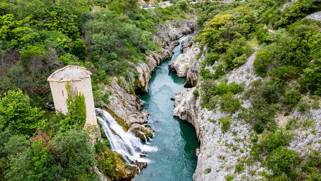 Aerial of an old watchtower in the Herault gorge, UNESCO World Heritage Site, Causses and Cevennes, Herault, Occitanie, France, Europe
