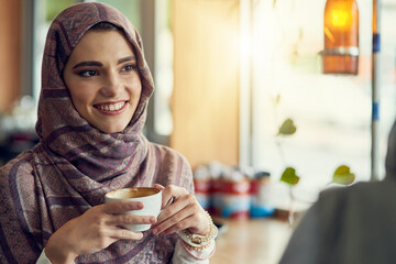 Smile, thinking and muslim woman with hijab in coffee shop for memory, happiness or peaceful lunch break. Lens flare, cappuccino and islamic person with cup for idea, remember or daydreaming in cafe
