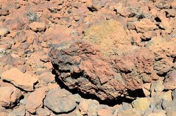 Scenic view of volcanic rock formations in desert during sunny day, Teide National Park, Tenerife
