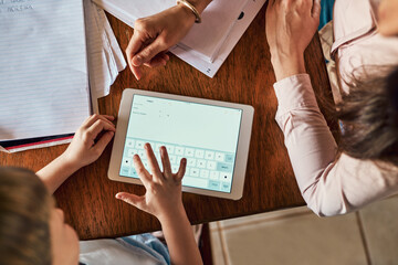 Homework, hands and mother with son, tablet screen and typing for project, elearning and helping. Closeup, parent and family with mama, boy and child development with tech, education or knowledge
