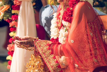 Detailed henna art and traditional attire at Indian wedding