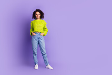 Full body photo of attractive young woman posing model dressed stylish green clothes isolated on violet color background