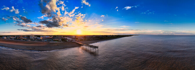 Panorama of the popular seaside holiday resort of Skegness on the east coast of england. Warm summer tones and sweeping vista views