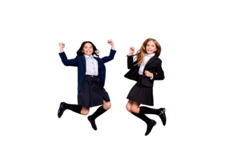 Full length photo of confident children raise fists wear trendy skirt long socks isolated over purple background