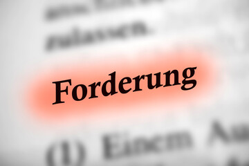 Obraz premium Forderung - Deutsches Text Wort mit roter Markierung