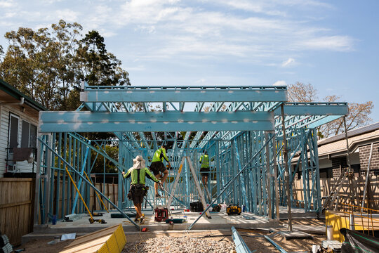 construction work on a suburban steel frame house