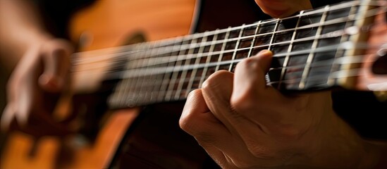 Fototapeta premium Close-up of playing an acoustic guitar with copy space image.