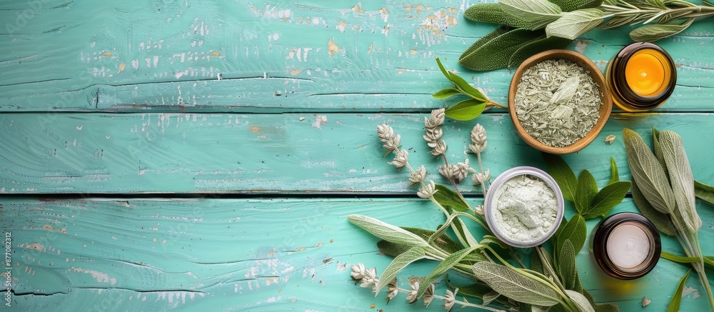 Poster sage herbs and beauty product samples displayed on a turquoise wooden table with a spacious copy spa