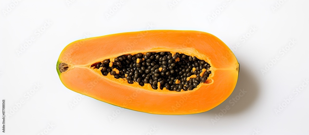 Poster top view of half a ripe papaya on a white background with copy space image included.