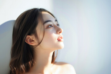 Naklejka premium アジア人女性の美容イメージ（スキンケア・ボディケア・エステサロン）
