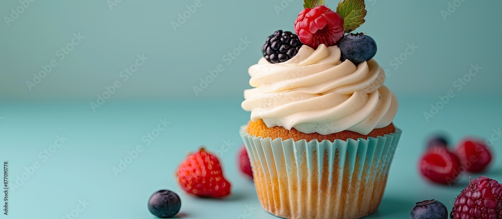 Poster decorated cupcake with berry garnish on top, perfect for an ad with copy space image.