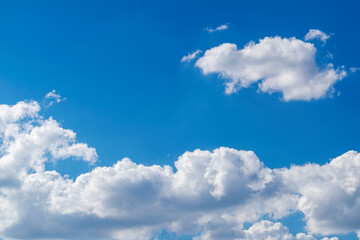 Beautiful blue sky with clouds. Space for advertising. Horizontal.