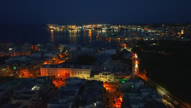Evening drone view of Birzebbuga city and port, Maltese island