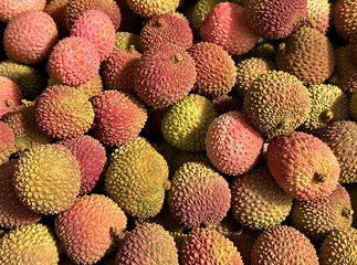 Close up view of dragon fruit, or pitaya, on sale on a market srtall. No people.