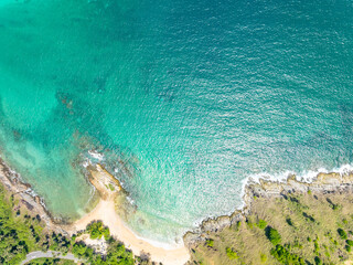 Obraz premium Amazing seascape view seashore and waves crashing on rocks,Aerial view beautiful sea in Phuket island Thailand