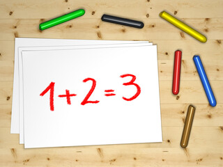 Fettstifte und ein Blatt Papier mit einer Rechnung 