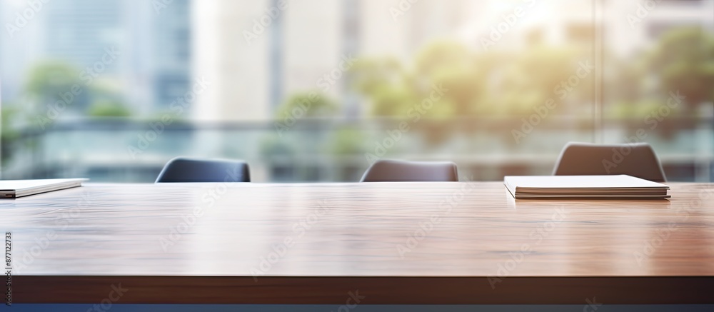 Aufkleber Blurry office background with table top featuring copy space image.