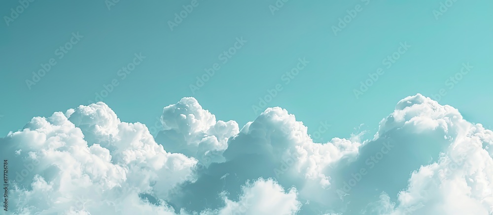 Poster soft-focus white clouds against a blue sky with a blank area for adding images, known as copy space 