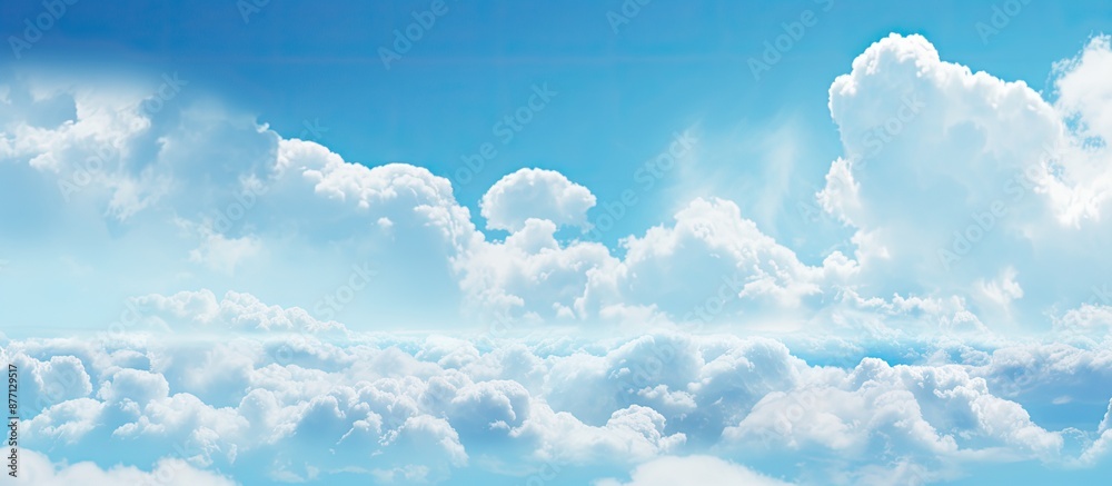 Aufkleber Scenic natural cyan clouds with open space for text or graphics in the image.