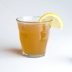hot Lemon  and  ginger ale with white background