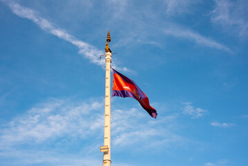 Cambodia national flag with Angkor wat in blue sky