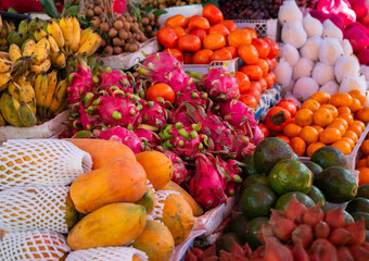 Tropical fruits and vegetables on local street market in Cambodia