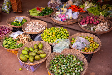 Tropical fruits and vegetables on local street market in Cambodia